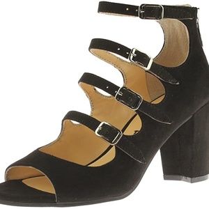 Black suede buckle shoes.  Unisa Undarrah